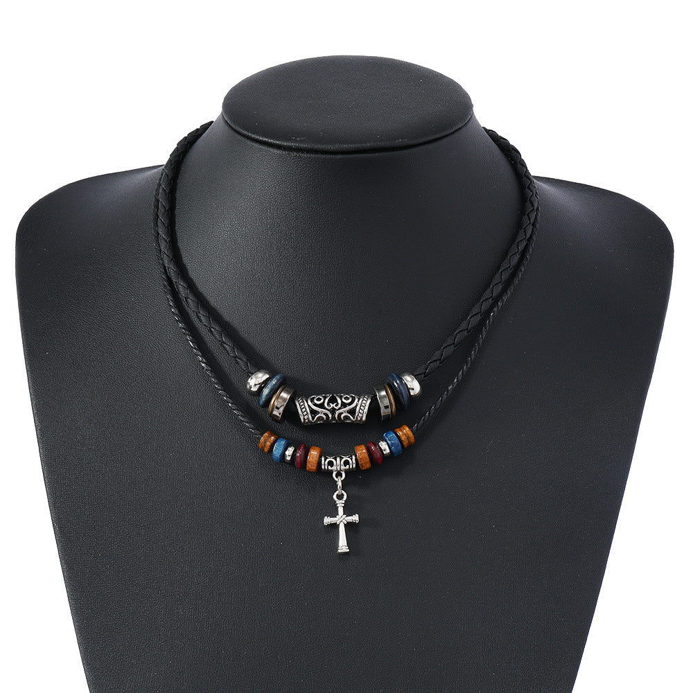 Model wearing Double Cross Wood Bead Necklace with alloy cross pendant and wooden beads.