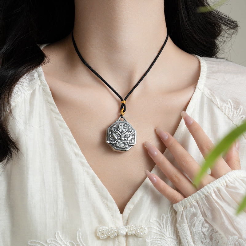 Bagua Amulet Necklace worn by model, showcasing its stylish and meaningful design for protection and harmony