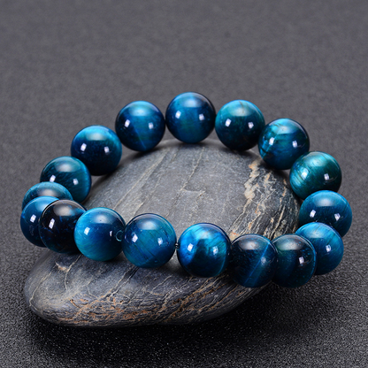 Detailed view of the Blue Tiger Eye beads, emphasizing their rich color and polished finish