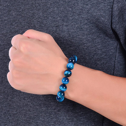 Blue Tiger Eye Bracelet worn on the wrist, demonstrating its stylish and empowering look