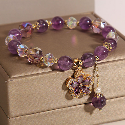 Detailed view of the five-leaf clover design, featuring the unique blend of amethyst and pearl for spiritual harmony