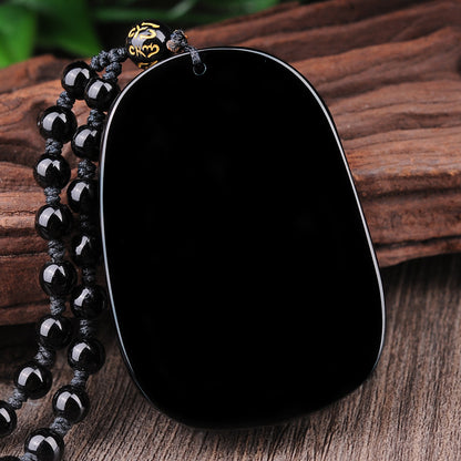 Back view of Black Obsidian Dragon Pendant Necklace, showcasing the smooth finish and quality craftsmanship