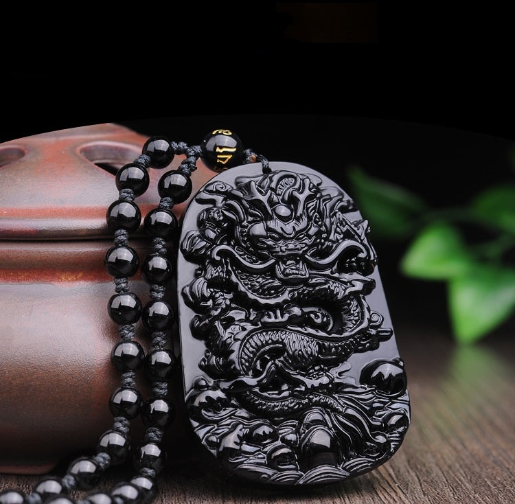 Close-up of Black Obsidian Dragon Pendant Necklace, featuring the pendant and durable bead necklace