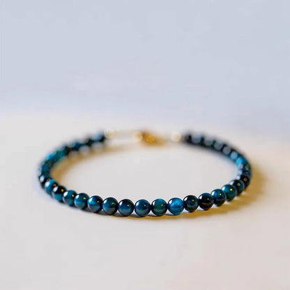 Close-up of the blue tiger eye beads on the Natural Blue Tiger Eye Protection Bracelet