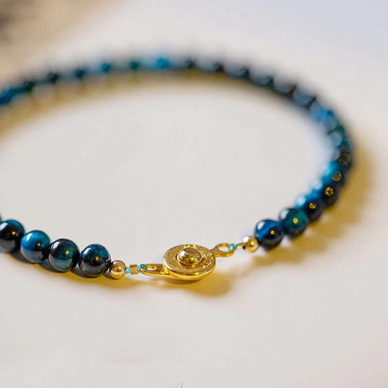 Detailed view of the protection chain design on the Natural Blue Tiger Eye Stone Bracelet