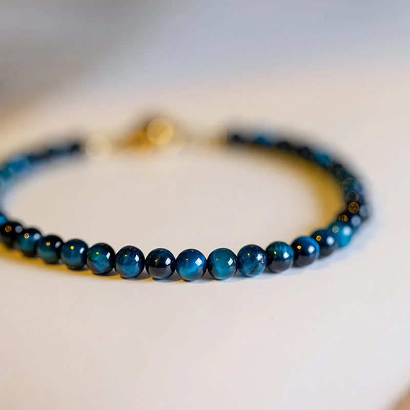 Side view of the Natural Blue Tiger Eye Stone Protection Bracelet, highlighting its elegant design