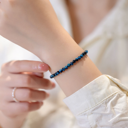 Close-up of the Natural Blue Tiger Eye Stone Protection Bracelet worn on wrist