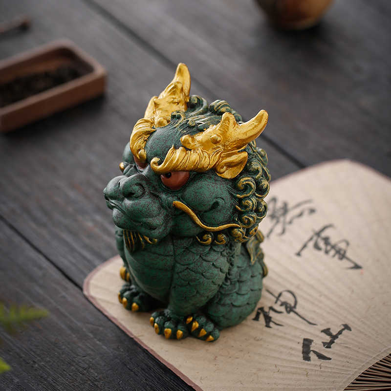 Qing Sha Stone Chinese dragon figurine displayed in a modern living space for Feng Shui