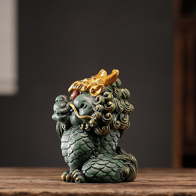 Side view of a hand-carved Qing Sha Stone Chinese dragon statue, featuring detailed carving.