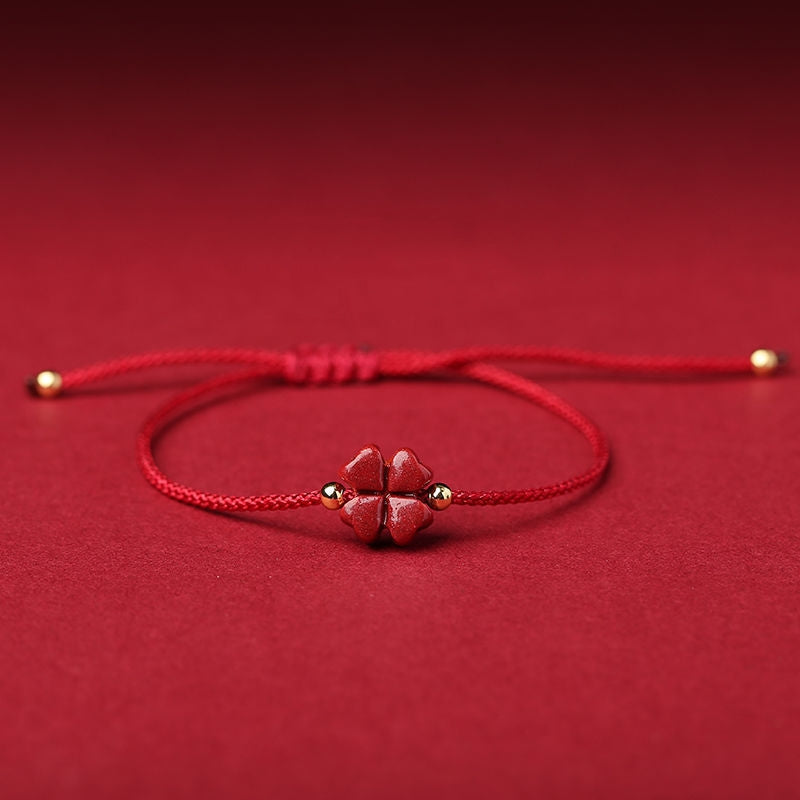 Natural Cinnabar Four Leaf Clover Blessing Red String Bracelet in dark red color