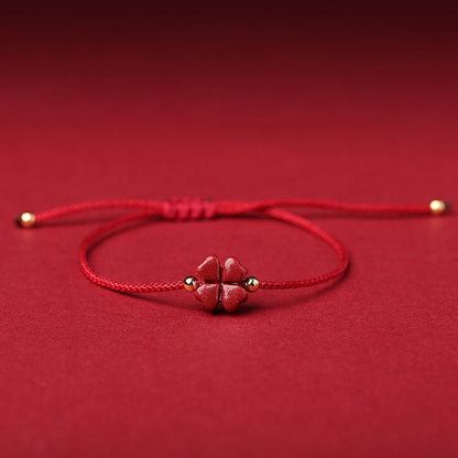 Natural Cinnabar Four Leaf Clover Blessing Red String Bracelet in dark red color