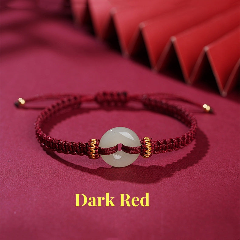 Dark red Hetian jade Peace Buckle Protection Bracelet in elegant design