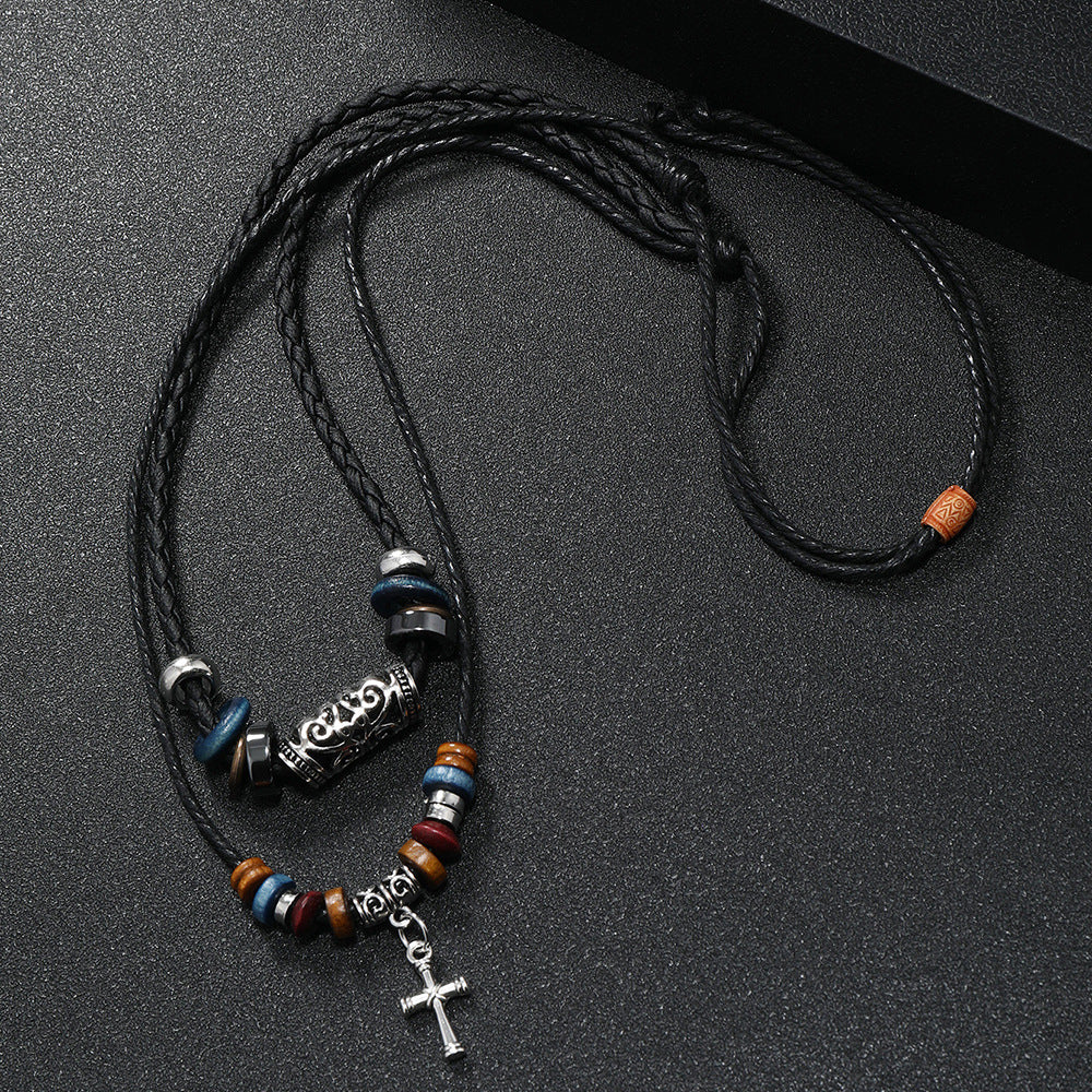 Double Cross Wood Bead Necklace displayed on a black panel, showcasing the alloy cross pendant and wooden beads