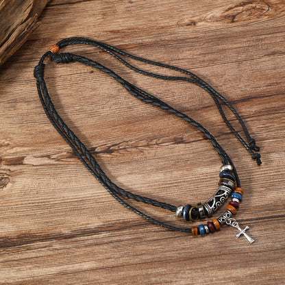 Side view of Double Cross Wood Bead Necklace highlighting the alloy cross pendant and wooden bead details