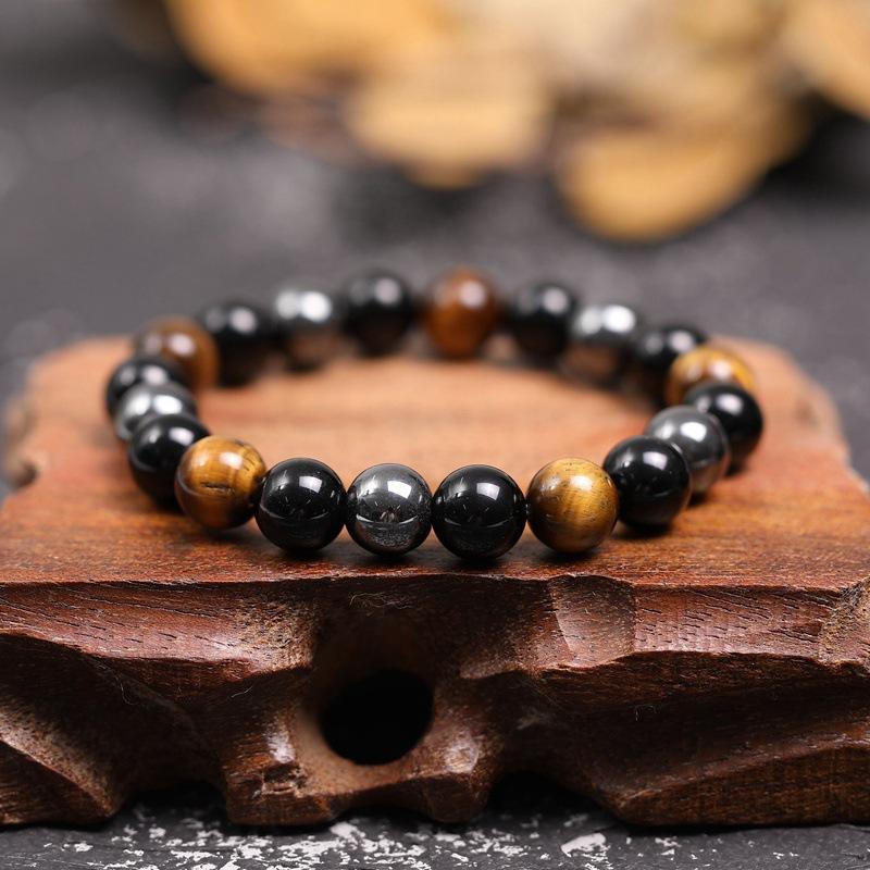 Energy bracelet featuring Tiger Eye, Obsidian, and Hematite