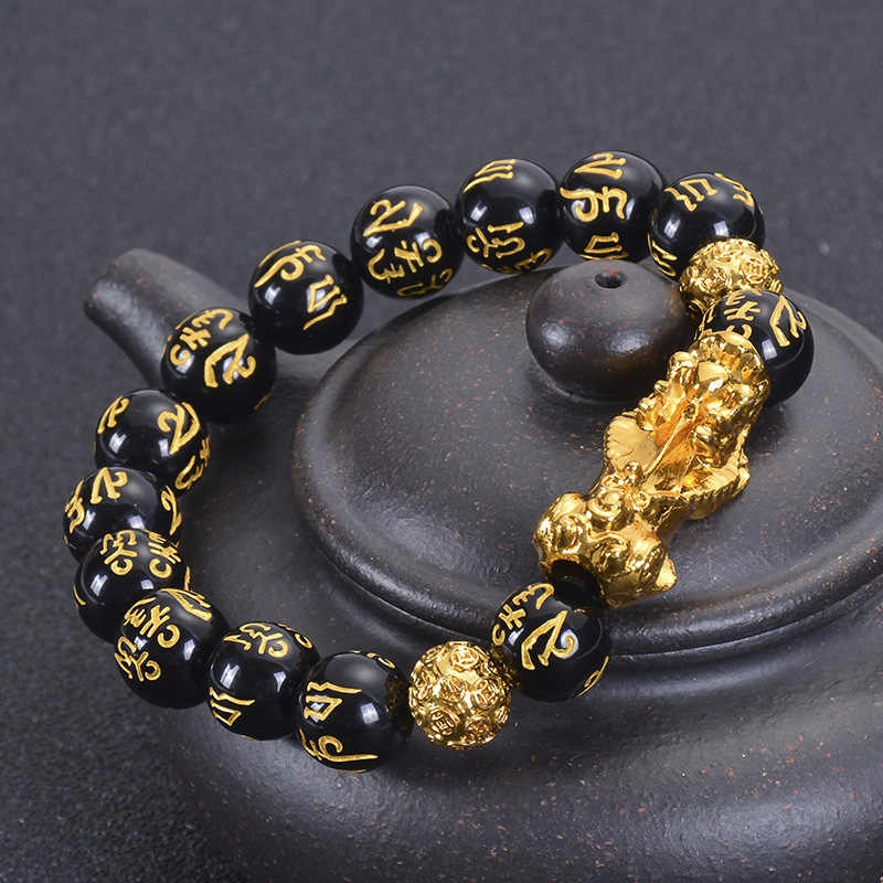 Feng Shui Pi Xiu Obsidian Bracelet worn as a protective and wealth-attracting accessory in daily life