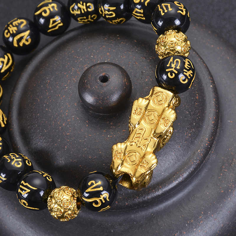 Lifestyle shot showing the Feng Shui Pi Xiu Obsidian Bracelet for prosperity and spiritual protection