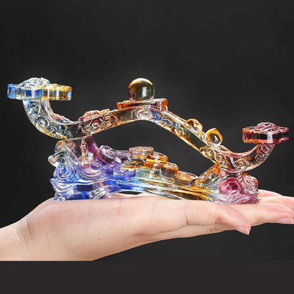 Detailed view of the crystal-like texture and craftsmanship of the glass Ruyi figurine