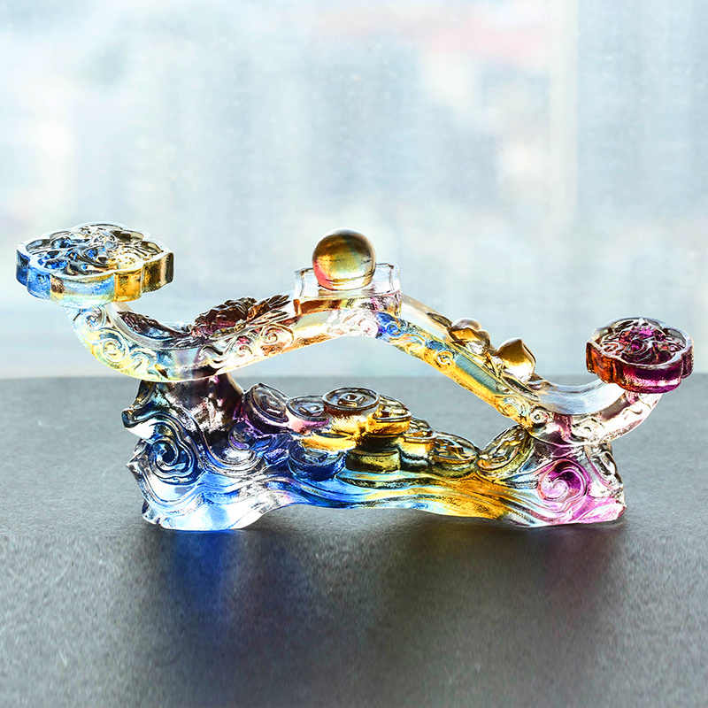 Glass Ruyi ornament placed in a home decor setting, adding positive energy to the space