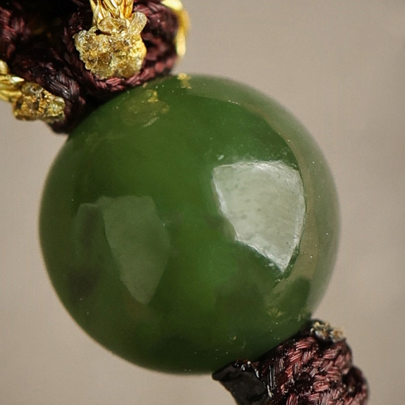 Close-up of Hetian jade stone on the pendant necklace