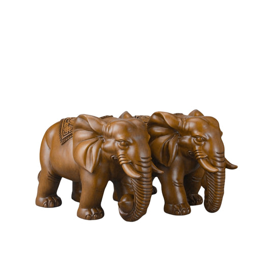 Pair of handcrafted resin elephant figurines on a white background, symbolizing harmony, strength, and good luck