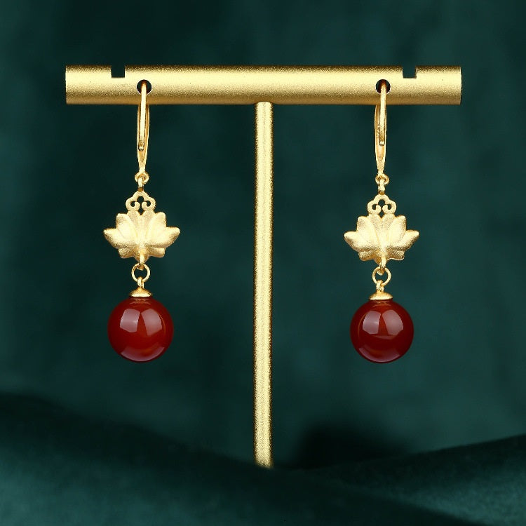 Back view of the pearl drop earrings with lotus flower design, showcasing the detailed craftsmanship and quality