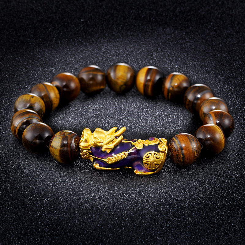 Tiger's Eye Feng Shui bracelet with Pi Xiu charm, symbolizing prosperity and good fortune