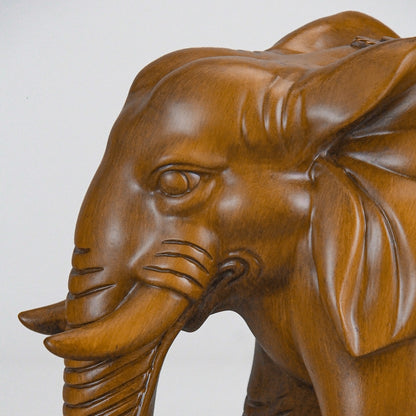 Close-up of resin elephant head, showcasing detailed trunk and ear features