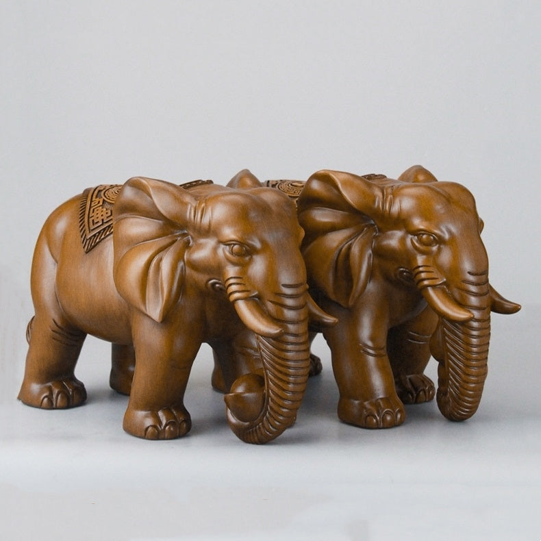 Another side view of the resin elephant sculpture, emphasizing the natural texture and fine craftsmanship