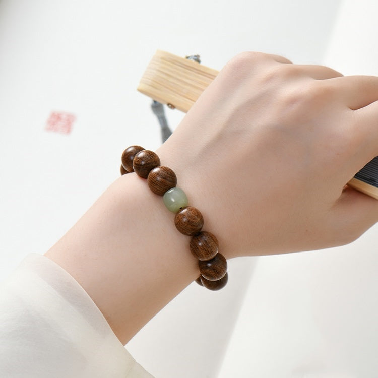 Sandalwood & Hetian Jade Buddhist Mala Bracelet worn on wrist, Perfect for Meditation and Mindfulness