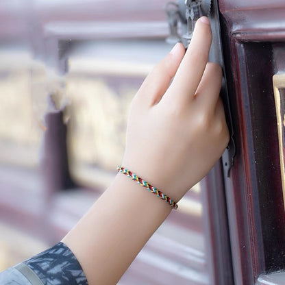 Tibet Handmade Protection Braid Bracelet worn on wrist, offering protection and positive energy