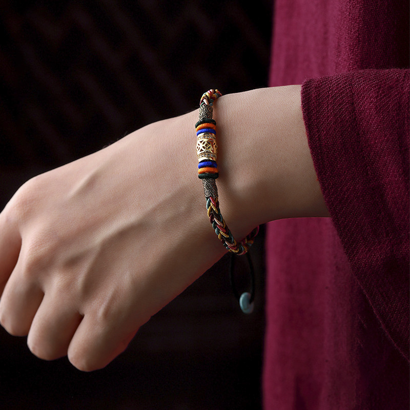 Tibetan Luck bracelet worn on wrist, designed to bring good luck and balance