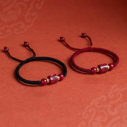 Tibetan Cinnabar Red and Black String Bracelets, both engraved with Six True Words for blessings and luck