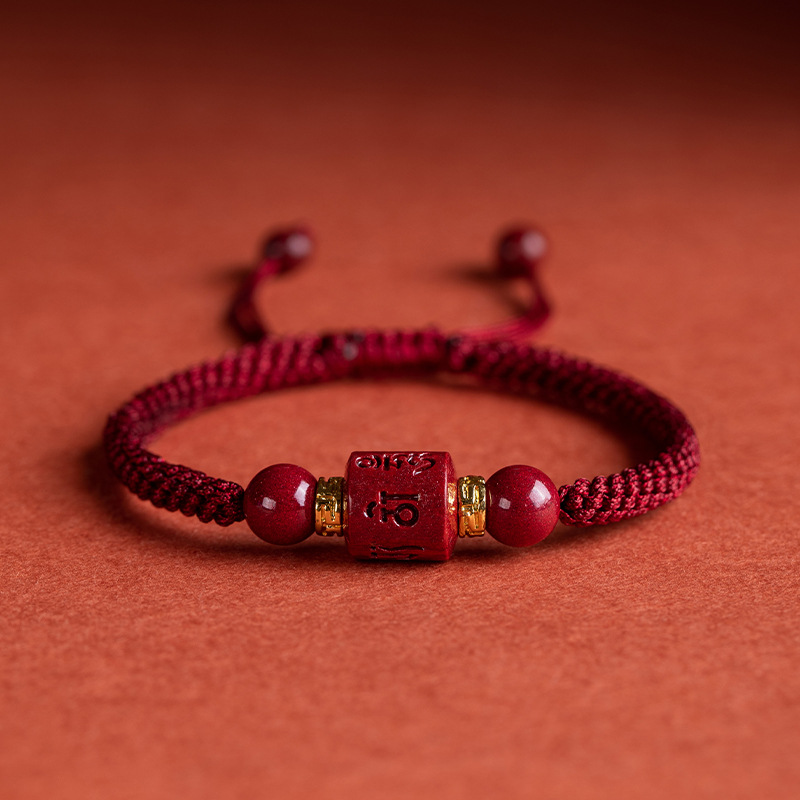 Tibetan Cinnabar Red String Bracelet, featuring Six True Words for protection, luck, and spiritual energy