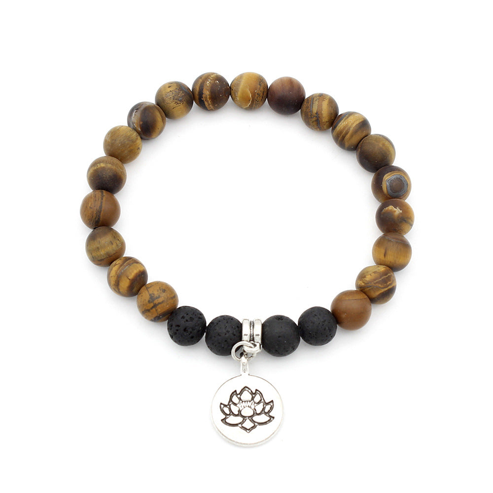 Close-up of Tiger Eye Lava Stone Bracelet with Lotus Charm