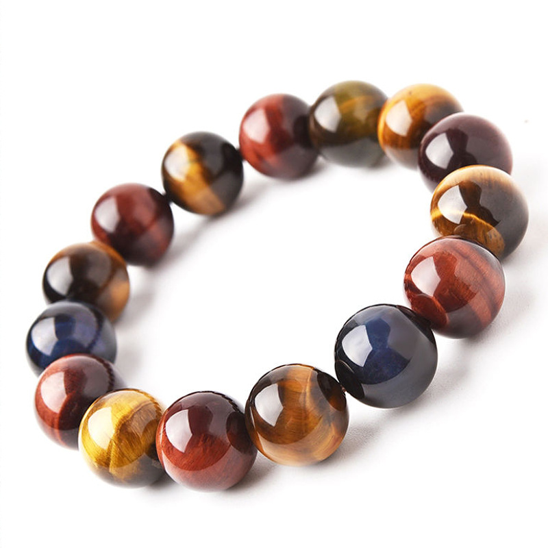 Angle view of the Natural Tiger Eye Positive Protection Bracelet on a white background