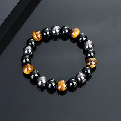 Energy bracelet featuring Tiger Eye, Obsidian, and Hematite stones