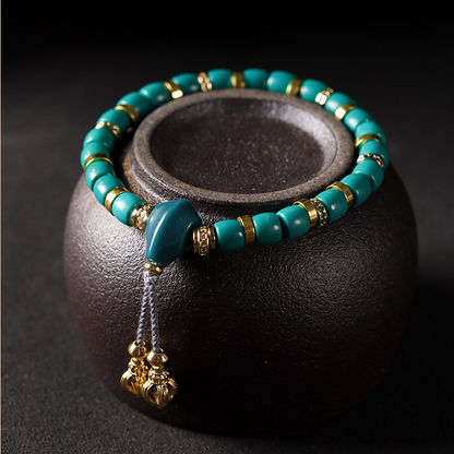 Detailed view of the Turquoise Lucky Bracelet, made with genuine turquoise stones